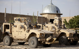 military vehicles parked in Middle Eastern country